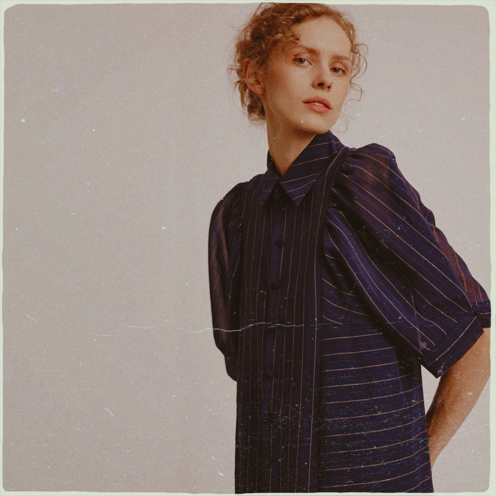 Women’s ready-to-wear look in navy with fine stripe detail by Antonia Zander