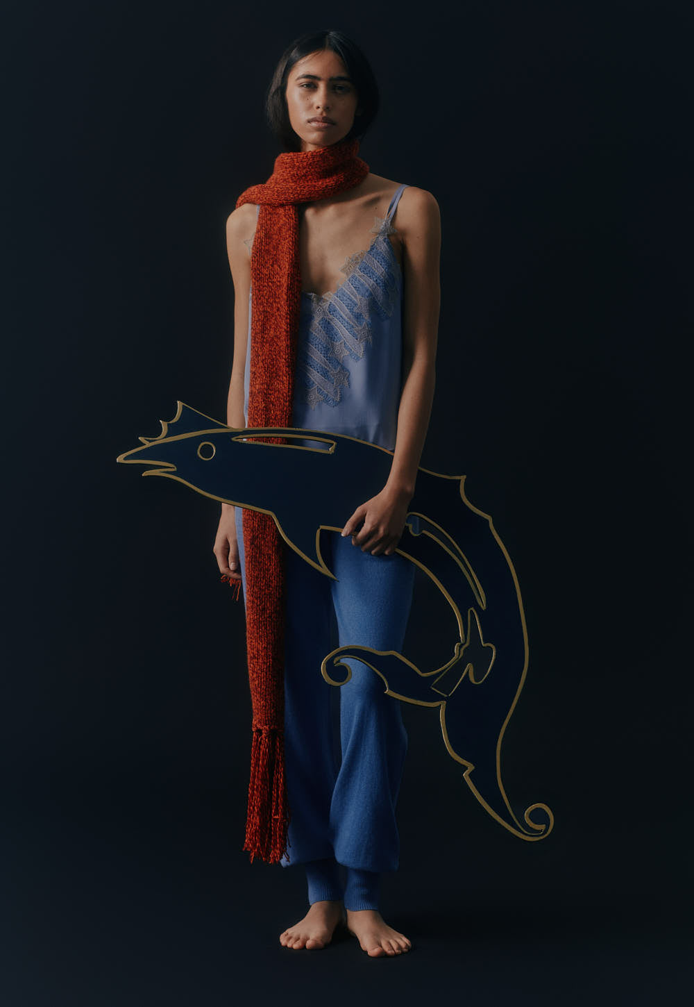 Model wearing the Antonia Zander Indra Top in Blue styled with cashmere trousers and the Antonia Zander scarf.