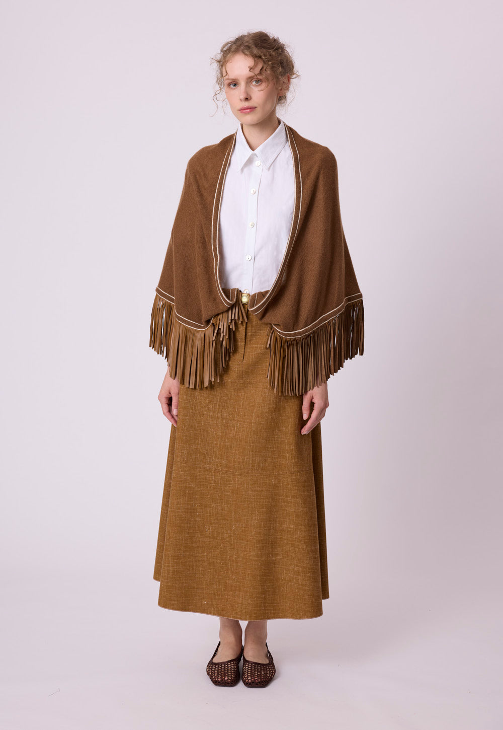 Silk viscose skirt in cognac with fluid movement and drape
