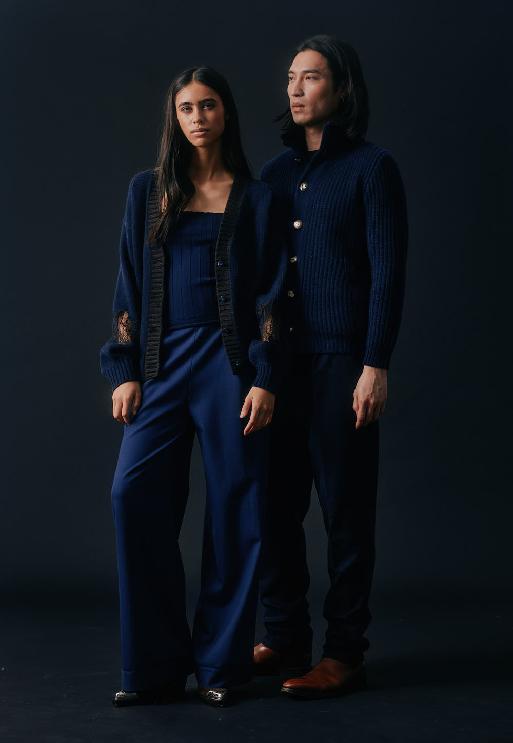 Antonia Zander Safra Cardigan in Navy crafted from luxurious 2/28 cashmere with delicate lace sleeve inserts and contrasting rib-knit trim.